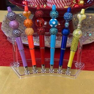 Glamorous, sparkly, and funky pens with unique designs. 1 pen and 1 free refill